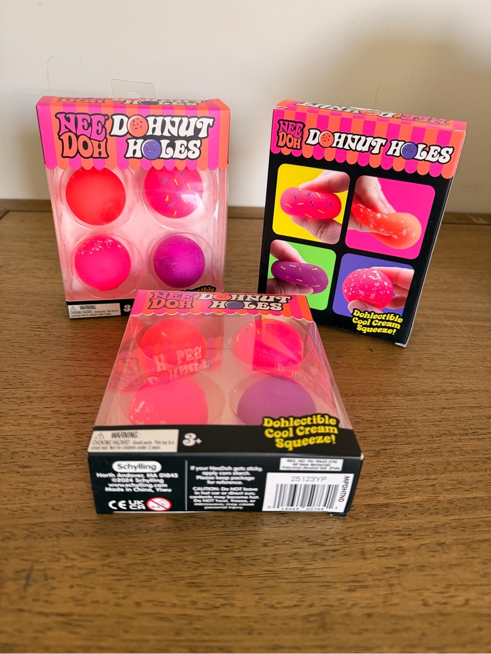 💜🩷 Need gifts? 2 boxes of NEEDOH Dohnut Holes Squishy Toys - Pink & Purple $49